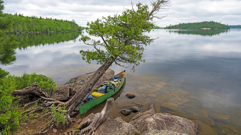 Canoe docked in north woods wonderland on Seagull Lake in the Boundary Waters in Minnesota