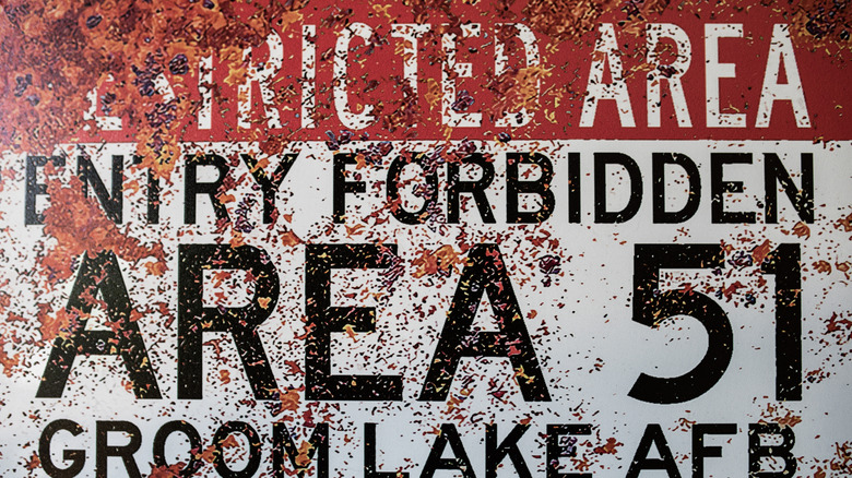 An old rusted looking Area 51 warning sign.