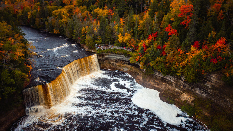 Aerial view of the Tahquamenon Falls in Michigan with autumn foliage