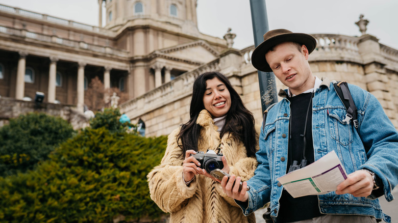 Two tourists exploring Budapest
