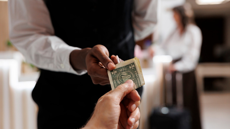 A person offering a tip