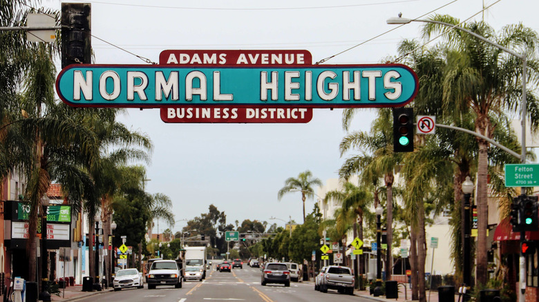 This is a picture of the Normal Heights sign and the main street of Adams Avenue