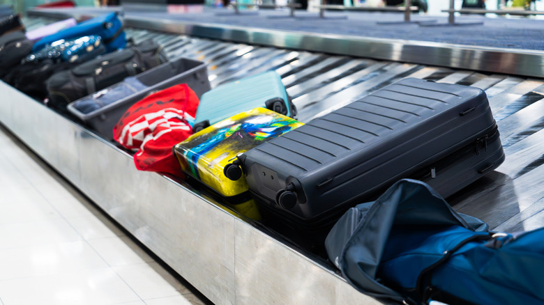Luggage on an airport conveyor belt