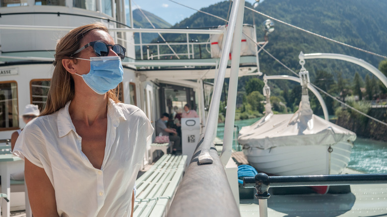 Masked passenger on cruise ship