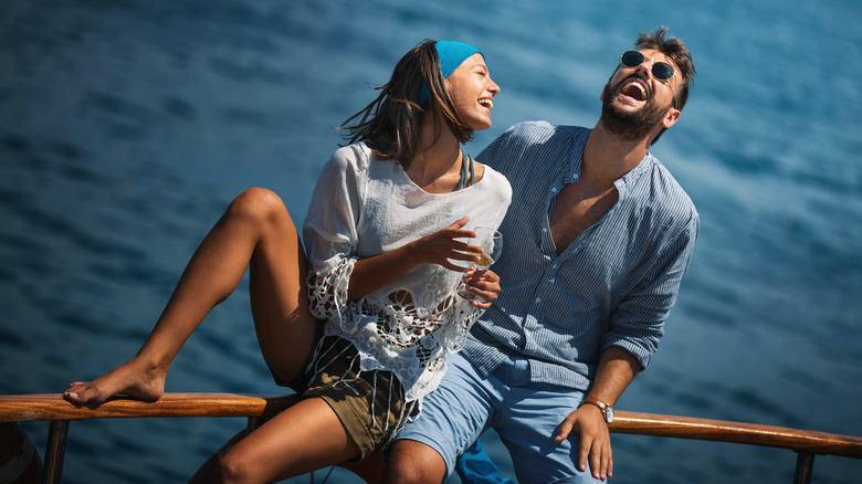 Couple on cruise ship railing