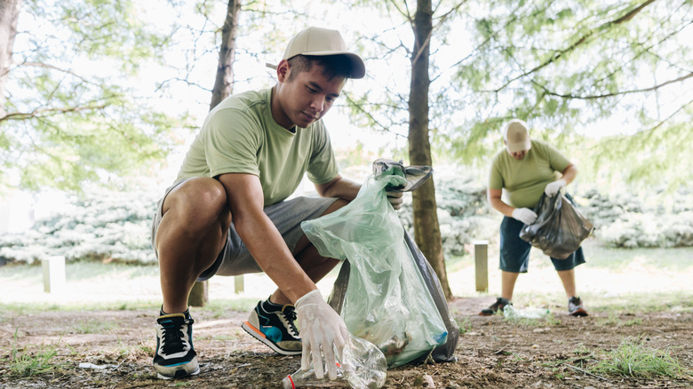 Volunteer cleans up litter in park