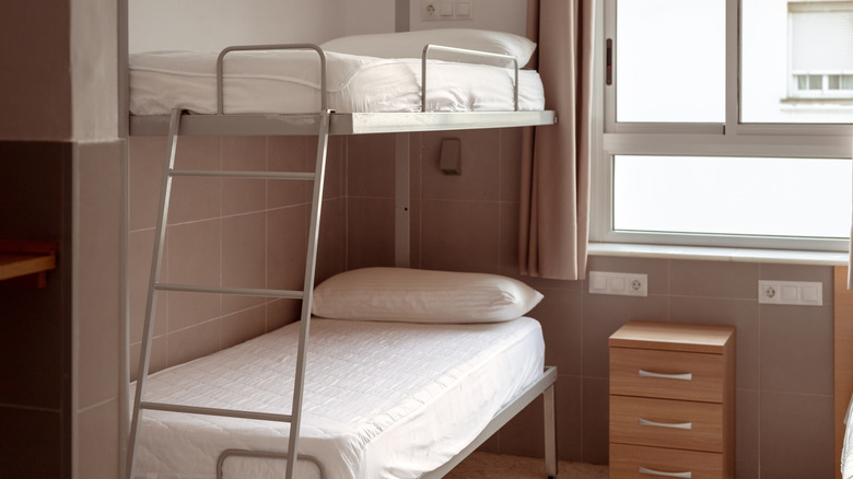 Clean bunk bed in dorm room in hostel