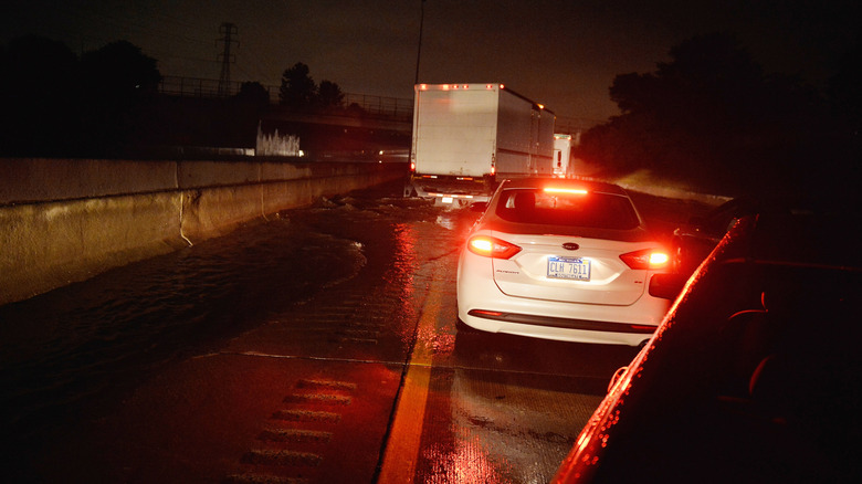 Cars driving on the flooded I-75 in Detroit