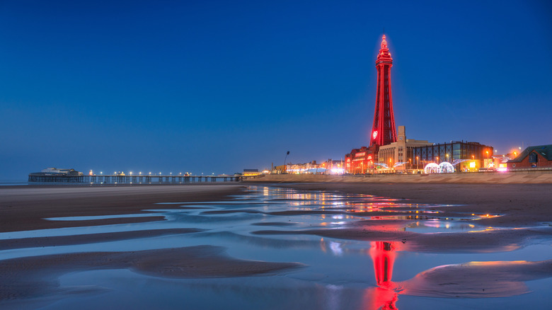 Blackpool tower at dusk and its reflection on the wet sands