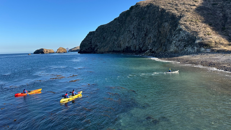 Kayakers paddle around Santa Cruz Island, Channel Islands National Park