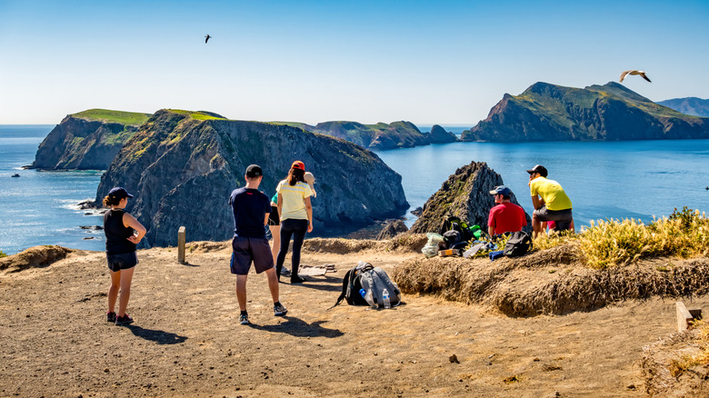 Visitors relax at an overlook on Anacapa Island in Channel Islands National Park