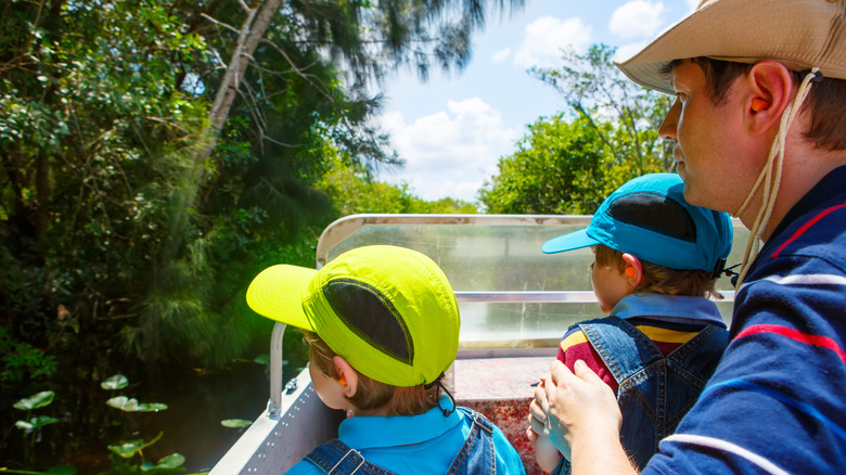 Kids on a boat in the Everglades, Florida
