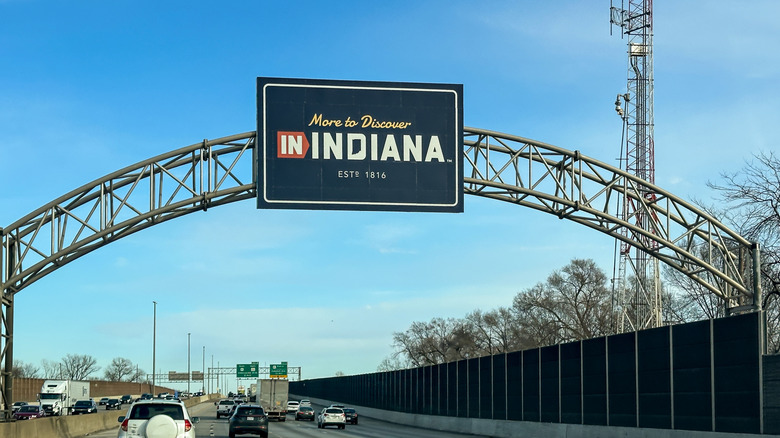 "More to Discover In Indiana" border welcome sign on the expressway between Illinois and Indiana