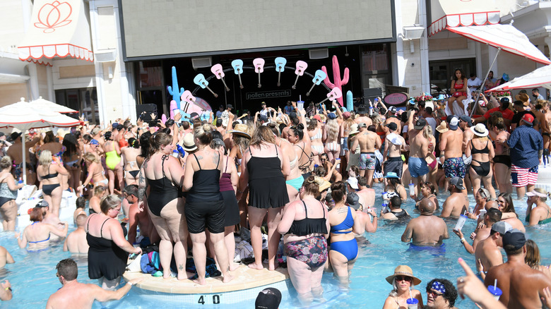 large group of people at vegas pool party
