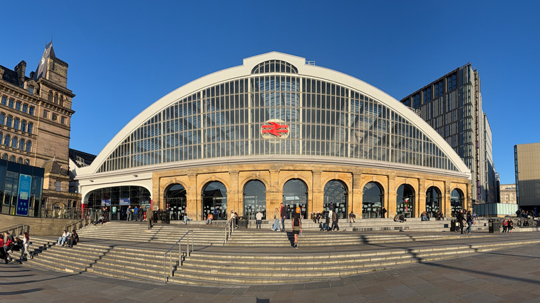 Panoramic view of Lime Street station featuring the glass-domed station entrance in Liverpool