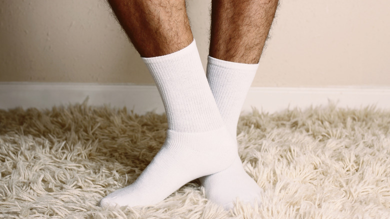 Man wearing white cotton socks