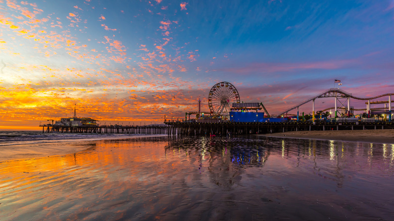 Santa Monica Pier overlooking beach at sunset
