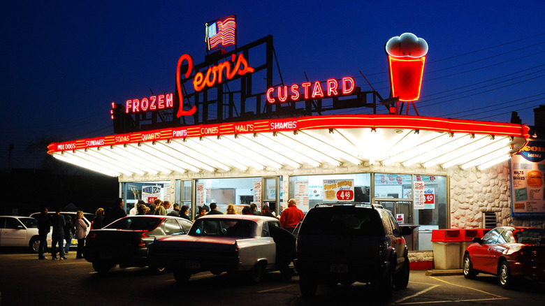 Cars are parked in front of Leon's Frozen Custard, and iconic 1950s historic diner and ice cream parlor