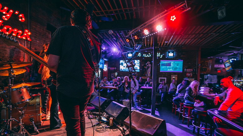 A band performing in a honky tonk in Nashville