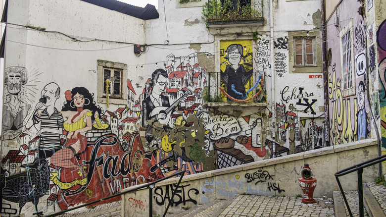 Colors and street art in the Escadinhas de São Cristóvão, in the historic center of Lisbon, Portugal