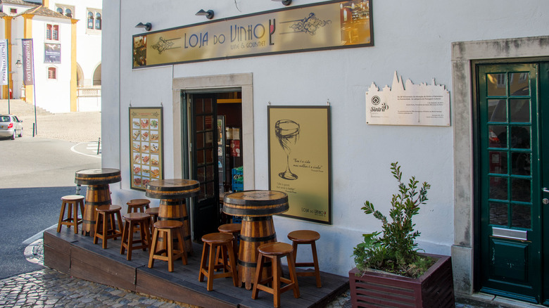 Restaurant and wine shop on a typical narrow street, Sintra, Portugal