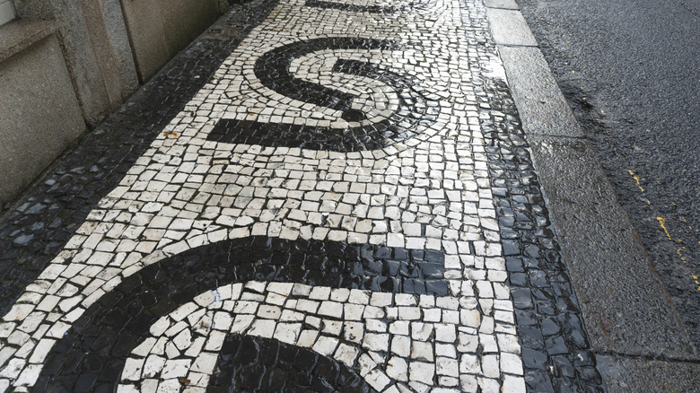 Antique cobblestone mosaic street in Porto