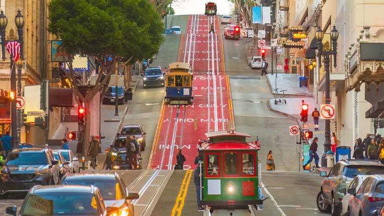 Historic cable cars on a hill in San Francisco