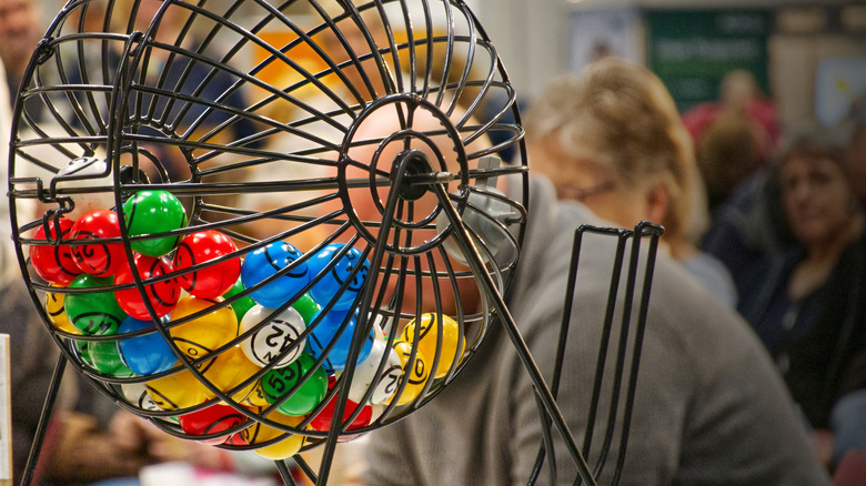 A bingo drum full of colorful number balls