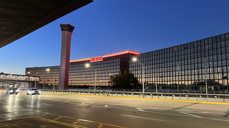 Exterior view of Hilton Hotel at Chicago O'Hare International Airport at the blue hour just after sunset.