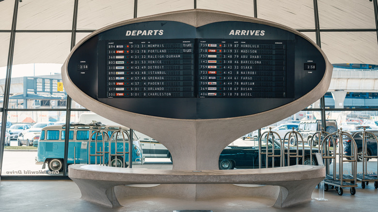 Vintage split-flap departures and arrivals board at the TWA Hotel lobby, JFK Airport in New York City