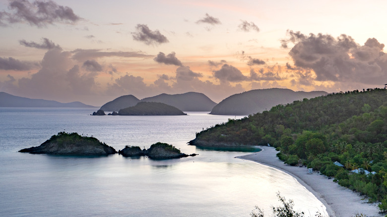 Vibrant sunrise over famous Trunk Bay on the tropical Caribbean island of St. John in the US Virgin Islands