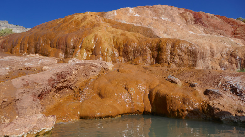 water running down the hillside at Red Hill Hot Springs in Monroe, Utah
