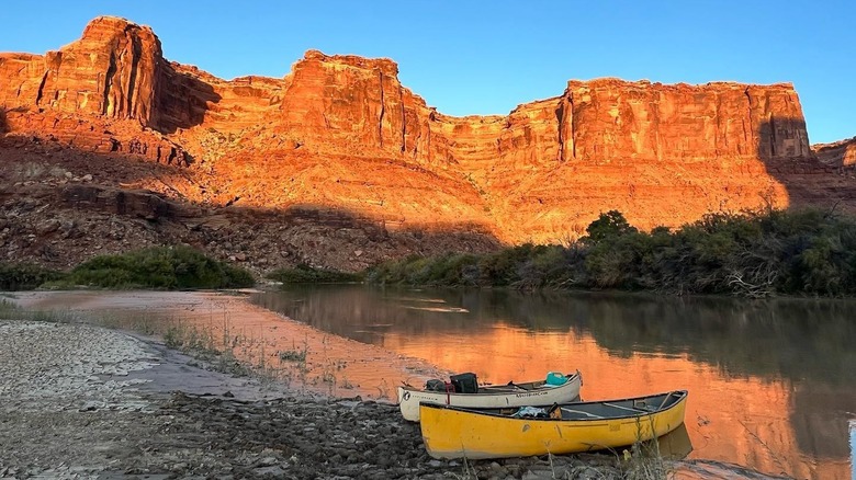Two canoes on the shore of the Green River in Labyrinth Canyon