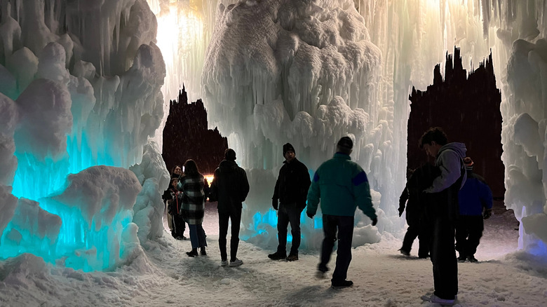 People in the Ice Castles installation in Midway, Utah