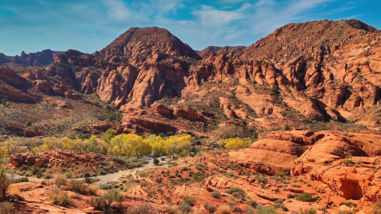Vibrant red rock formations with the campground at its foothills at Red Cliffs National Conservation Area near St. George, Utah