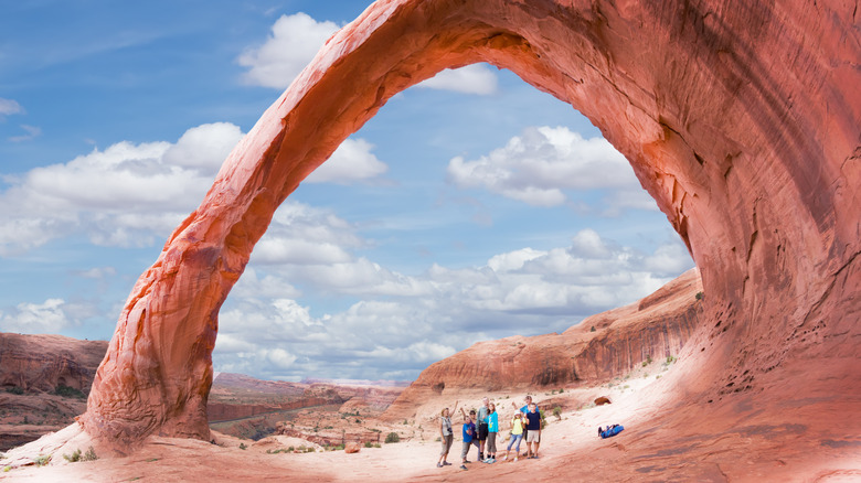 Group of people under Corona Arch
