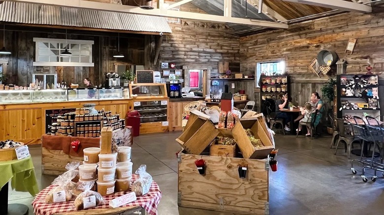 Rowleys Red Barn in Washington Utah, with an ice cream counter in the back, with tables and displays with local treats