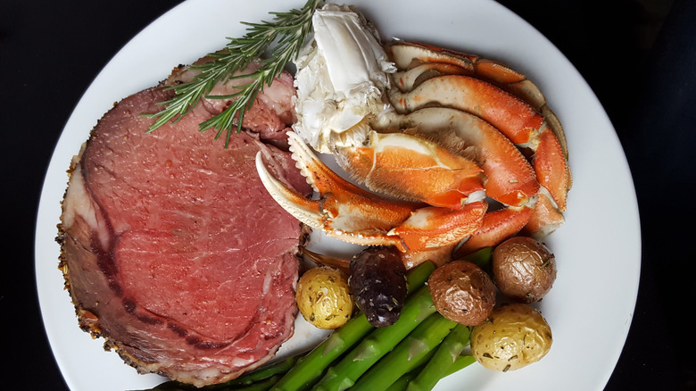 Stock photo of a complete meal featuring prime rib