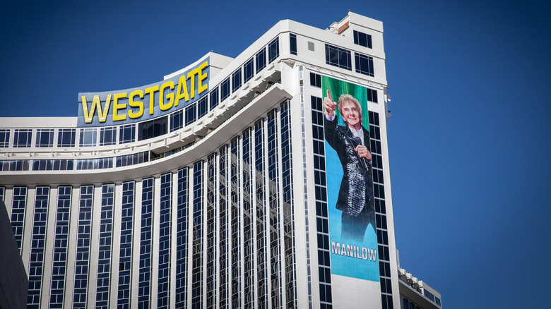 The exterior of the Westgate Las Vegas Resort & Casino with a large banner of Barry Manilow