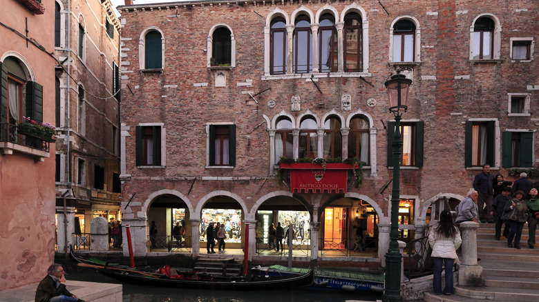Exterior shot of Campo Santi Apostoli with front canal entrance of the Hotel Antico Doge