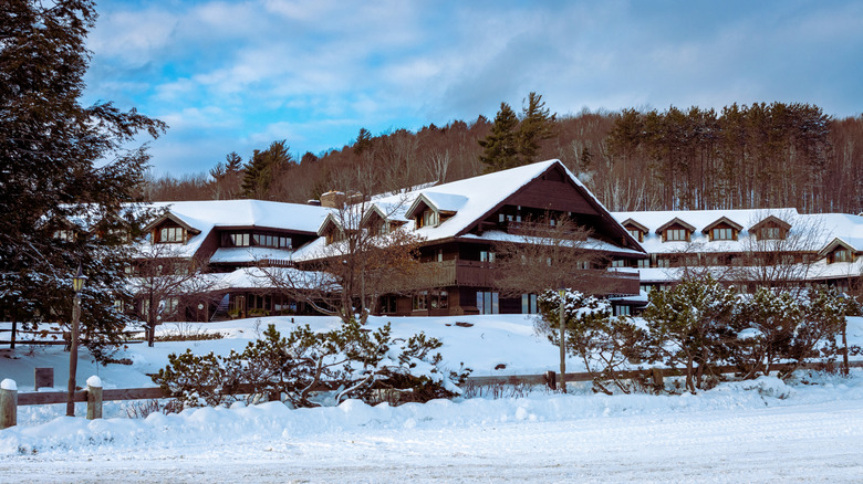 Von Trapp Lodge & Resort and forested landscape covered in snow