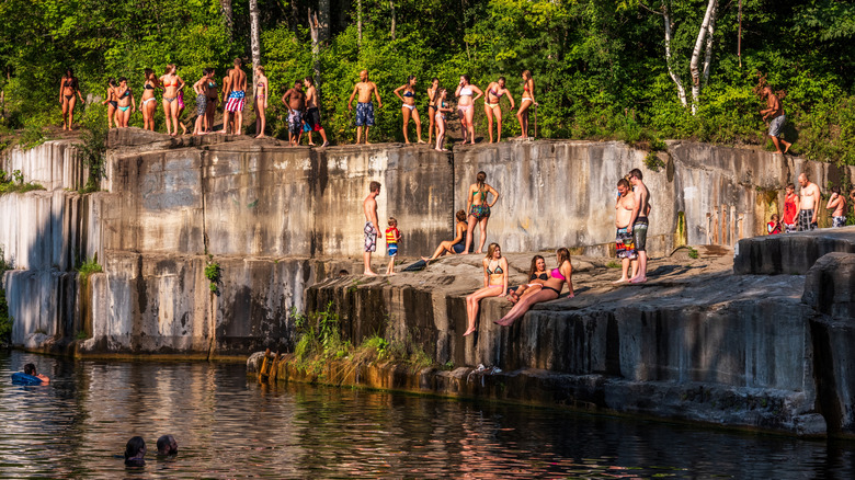 People relaxing and swimming at Dorset Marble Quarry