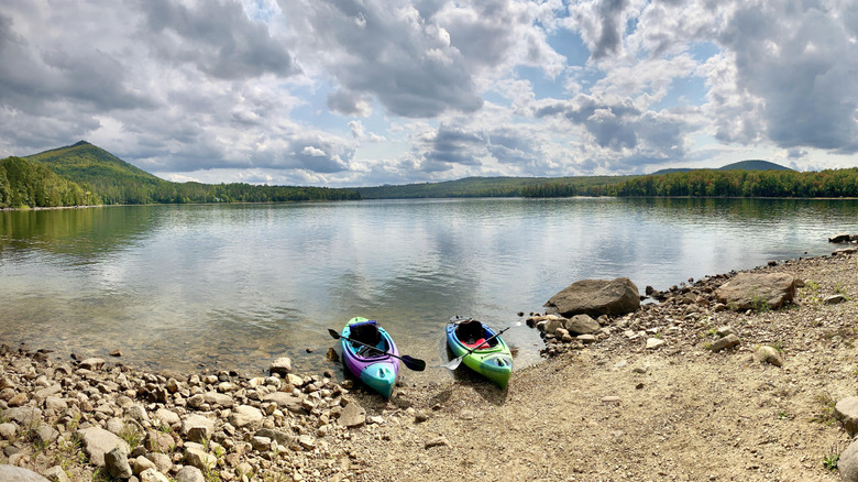 Two kayaks at the lakeshore of Molly's Falls Pond State Park