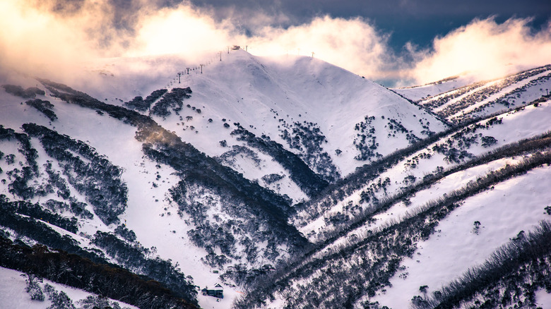 Snowy mountains topped with clouds in Hotham Heights in the Australian Alps