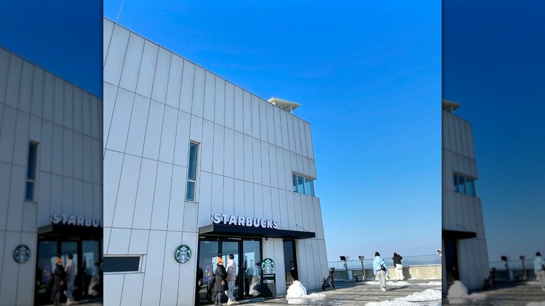 People outside the Starbucks at Aegibong Peace Ecopark in South Korea