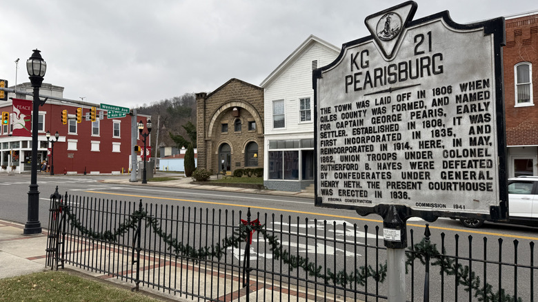 A picture of Pearisburg, VA historic sign along with buildings