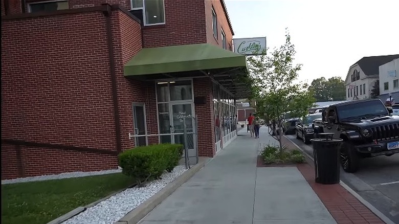 Sidewalk view of Curklin's brick building in Big Stone Gap