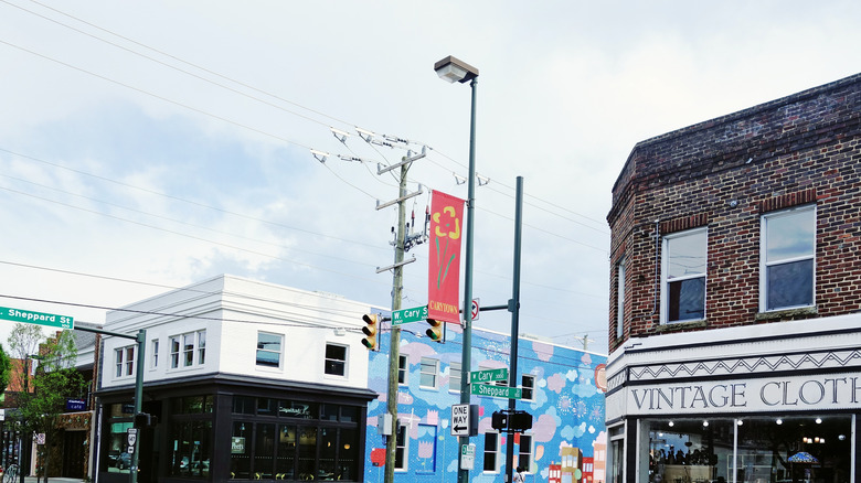 Carytown shops featuring a hanging lamp post banner