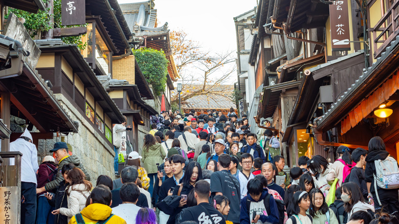 Crowd of tourists in Ninenzaka street in Kyoto, Japan