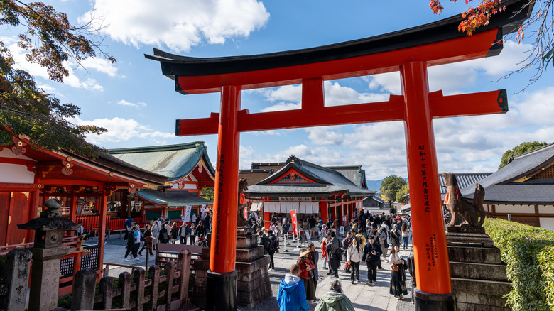 Crowds gathered at Fushimi Inari Taisha Temple in Kyoto, Japan